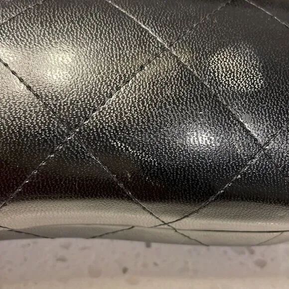Chanel black leather quilted sunglass case. No sunglasses just the case